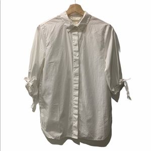 White shirt with ties on sleeves